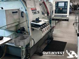 1  -  Torno cnc de cabezal móvil