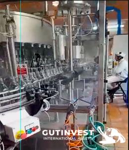 1  -  Glass bottle filling machine. Capacity 10,000 bottles/hour
