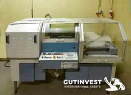 2  -  Máquina termo retractiladora