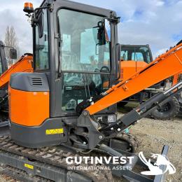 3  -  Mini excavadora de orugas