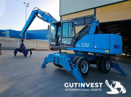 1  -  Waste material handler