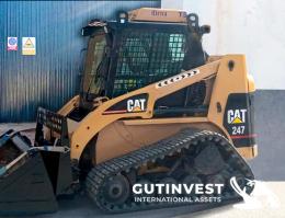 1  -  Minicargadora de orugas