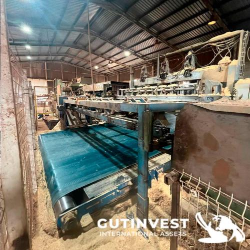 Sawmill for manufacturing wooden pallet panels