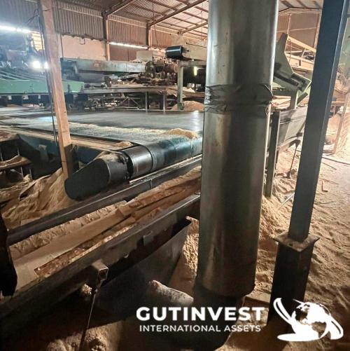 Sawmill for manufacturing wooden pallet panels