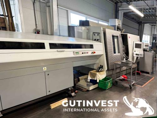 Torno CNC con alimentador de barras