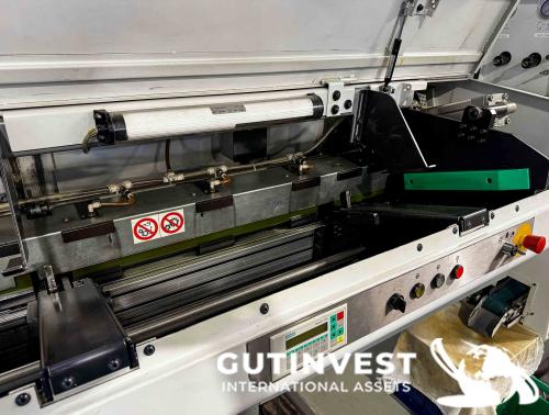 Torno CNC con alimentador de barras