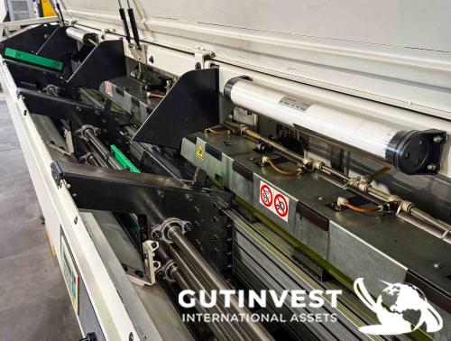 Torno CNC con alimentador de barras