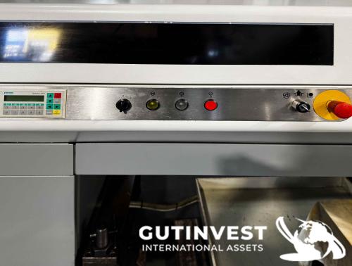 Torno CNC con alimentador de barras