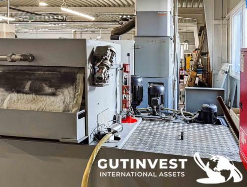 Torno CNC con alimentador de barras