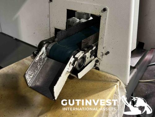 Torno CNC con alimentador de barras