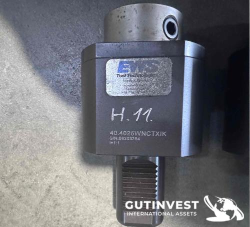 Torno CNC con alimentador de barras