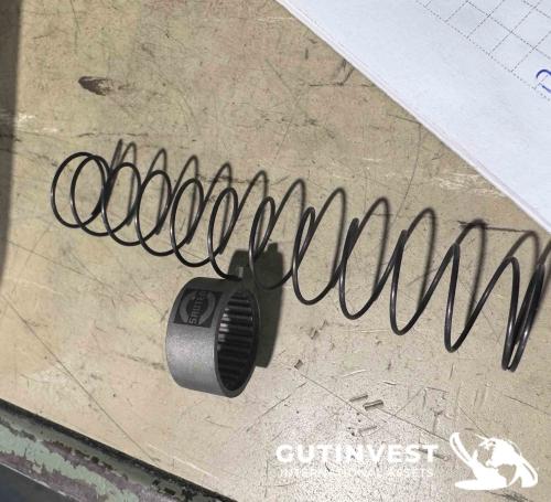 Torno CNC con alimentador de barras