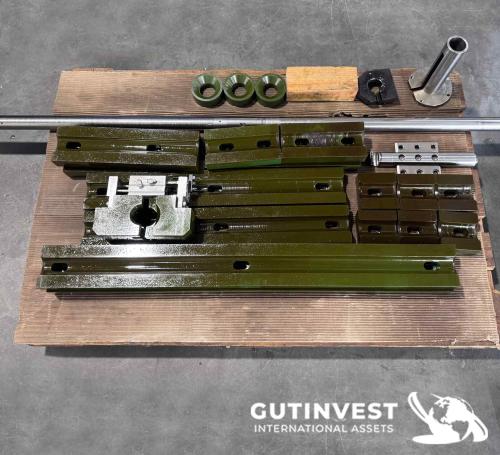 Torno CNC con alimentador de barras