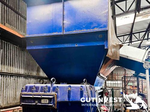 Triturador de dos ejes