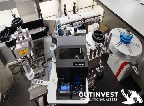 Maquina etiquetadora de botellas, tarros…