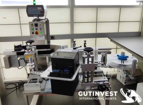 Maquina etiquetadora de botellas, tarros…