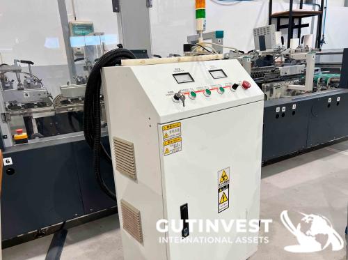 Máquina plegadora - encoladora de cajas