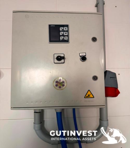 Marmita con polipasto