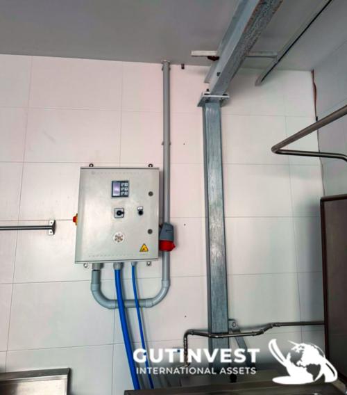 Marmita con polipasto