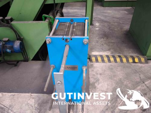 Linea con horno de templado y lavado de piezas