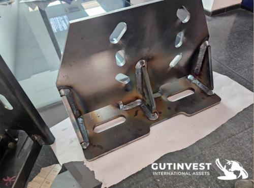 Welding robot with turn-over table