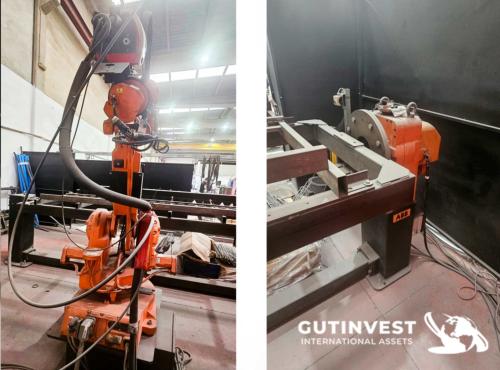 Welding robot with turn-over table