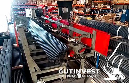 Automatic sawing machine for metal tubes and bars