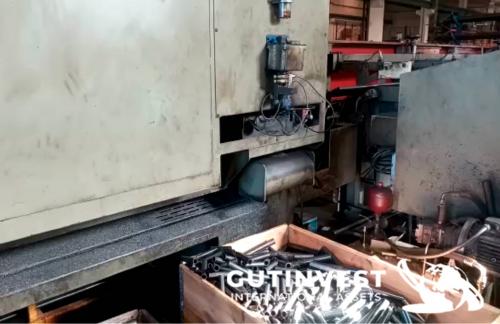 Automatic sawing machine for metal tubes and bars