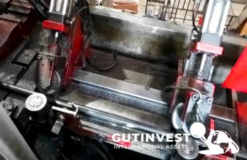 Automatic sawing machine for metal tubes and bars
