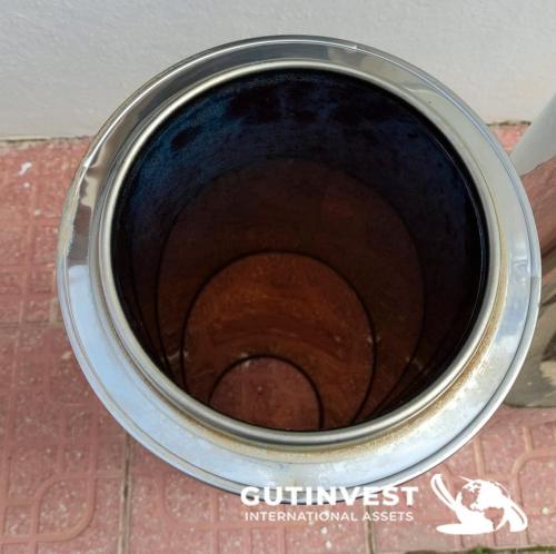 Stainless steel container with basket