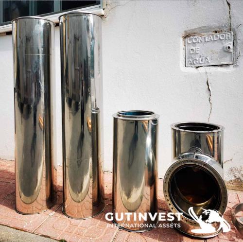 Stainless steel container with basket