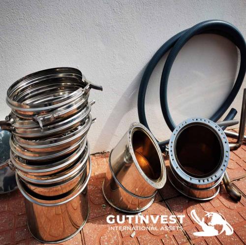 Stainless steel container with basket