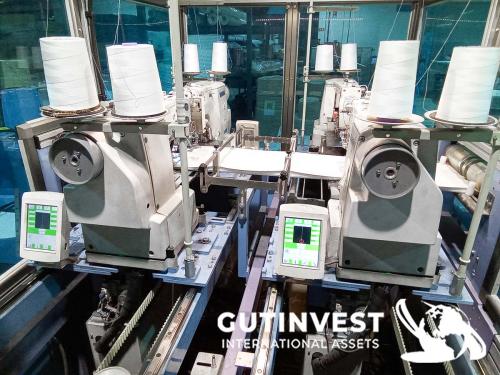 Embroidery machine with 4 sewing heads