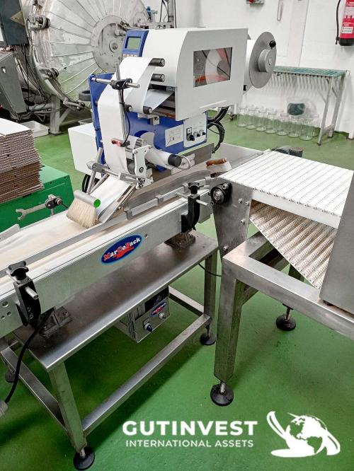 Línea automática de Termosellado de envases de plástico