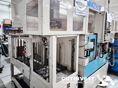 Twin spindle turning CNC chucker