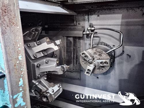 Twin spindle turning CNC chucker