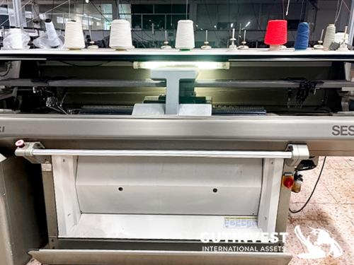 Máquina de tejer plana
