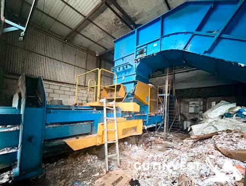 Cardboard baler press