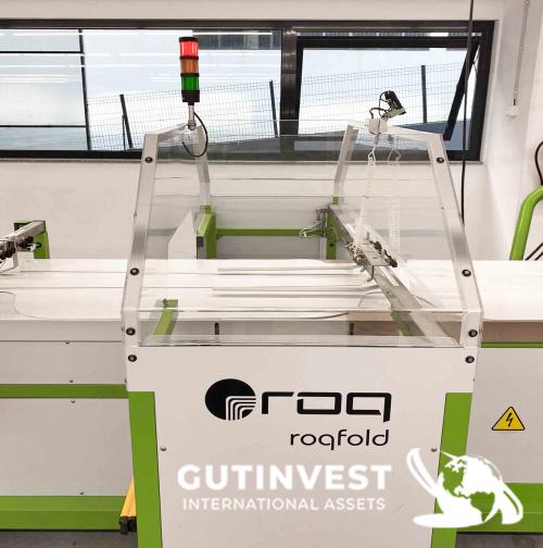 Máquina automática de doblado y embalaje de prendas
