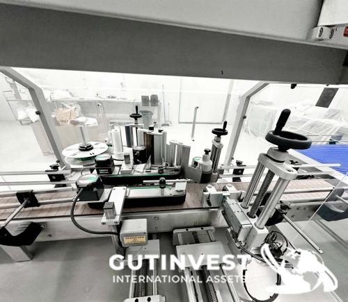 Máquina Etiquetadora botes cristal y plástico