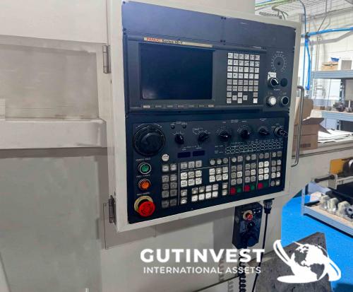 Torno doble cabezal con robot gantry
