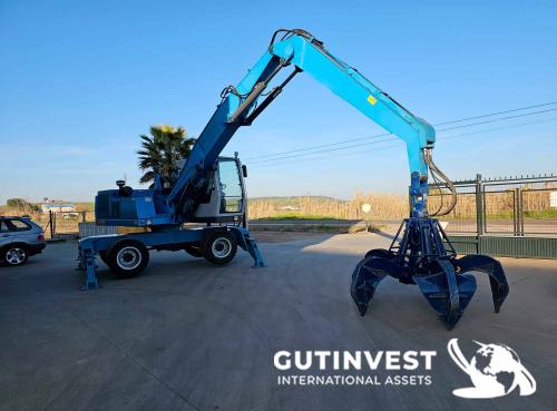 Waste material handler