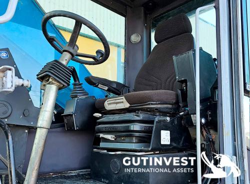 Waste material handler