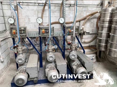 Instalación para alimentación de material a inyectoras de p