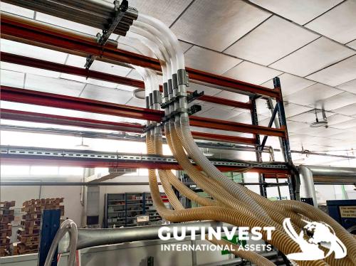 Instalación para alimentación de material a inyectoras de p