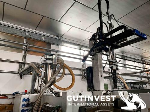 Instalación para alimentación de material a inyectoras de p