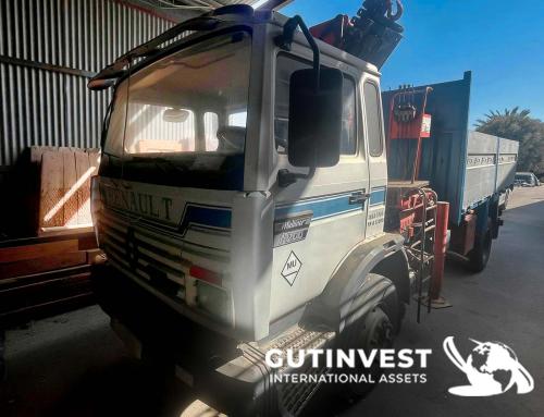 Truck with open box and crane