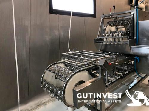 Máquina cascadora de huevos automática