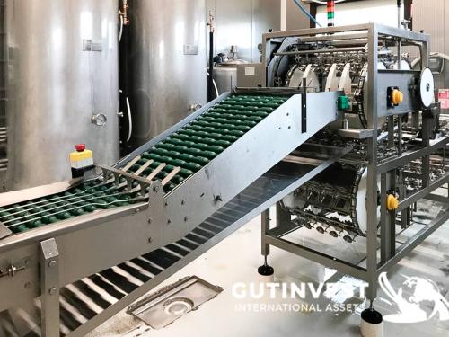 Máquina cascadora de huevos automática