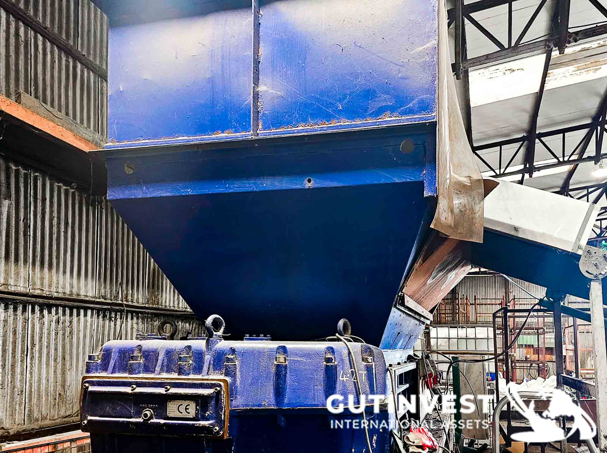 Triturador de dos ejes